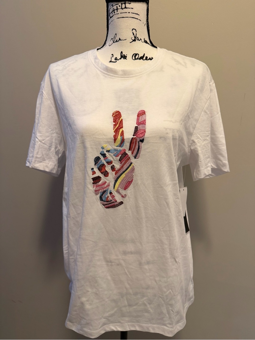 White Tee with Colorful Peace Sign Embroidery